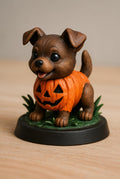 Dog in pumpkin costume figurine